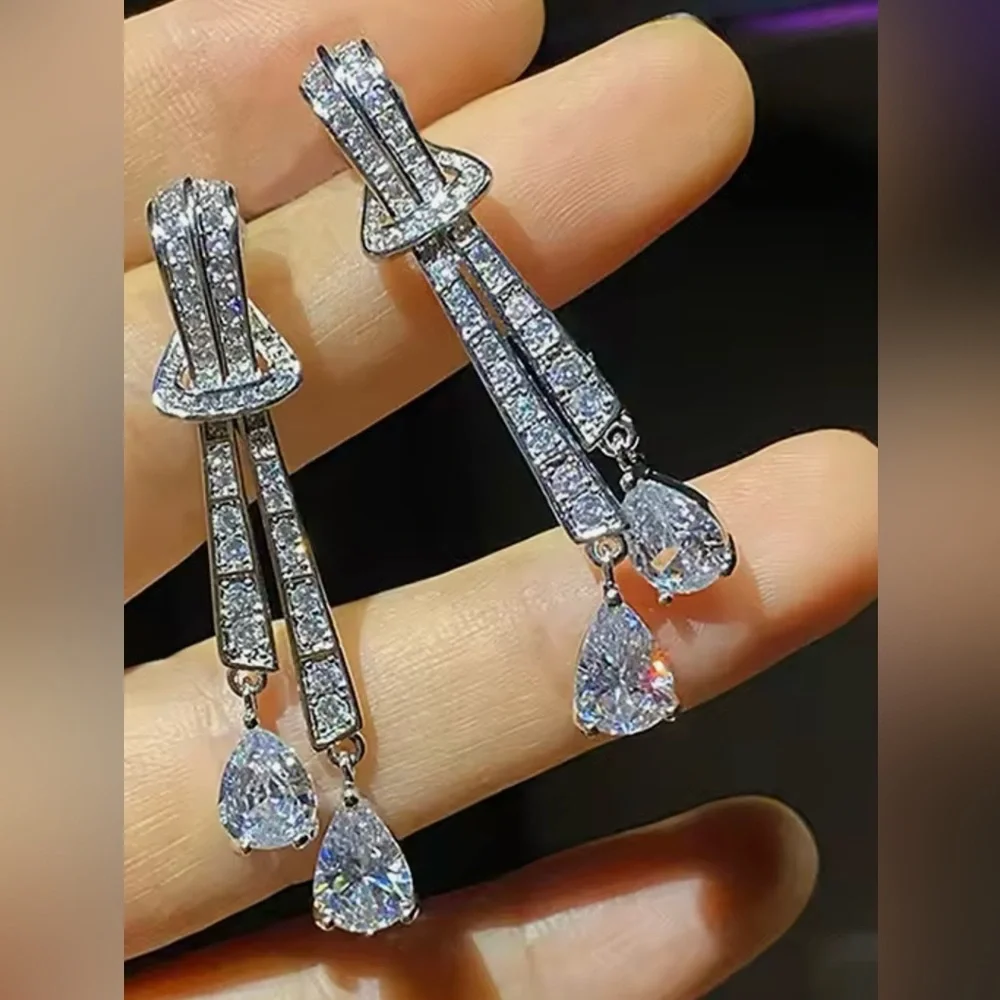 14k 4ct Pear Cut Dangle Earrings - Picture 3 of 11